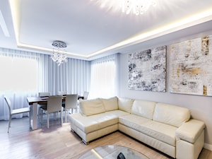 APARTAMENT Z OLIWKOWĄ DOMINANTĄ - Duży szary salon z jadalnią, styl nowoczesny - zdjęcie od STUDIO FORMA