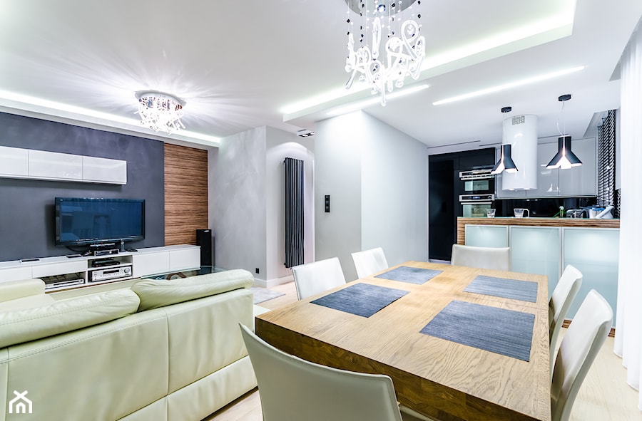 APARTAMENT Z OLIWKOWĄ DOMINANTĄ - Średnia biała szara jadalnia w salonie, styl nowoczesny - zdjęcie od STUDIO FORMA