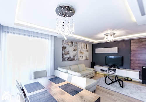 APARTAMENT Z OLIWKOWĄ DOMINANTĄ - Średni czarny szary salon z jadalnią, styl nowoczesny - zdjęcie od STUDIO FORMA