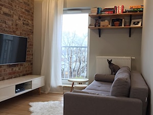 mieszkanie metamorfoza wola ok60m2 - Mały biały salon z tarasem / balkonem, styl skandynawski - zdjęcie od Grafika i Projekt architektura wnętrz