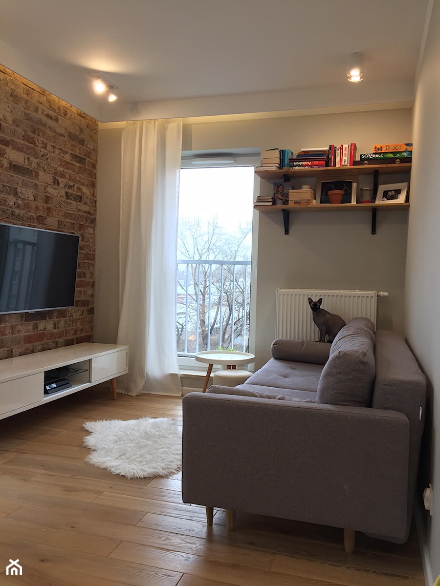 mieszkanie metamorfoza wola ok60m2 - Mały biały salon z tarasem / balkonem, styl skandynawski - zdjęcie od Grafika i Projekt architektura wnętrz