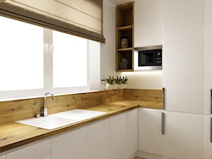 kuchnia w bieli,drewnie z dodatkami czarnego - metamorfoza - Średnia z salonem biała z zabudowaną lodówką z nablatowym zlewozmywakiem kuchnia, styl skandynawski - zdjęcie od Grafika i Projekt architektura wnętrz