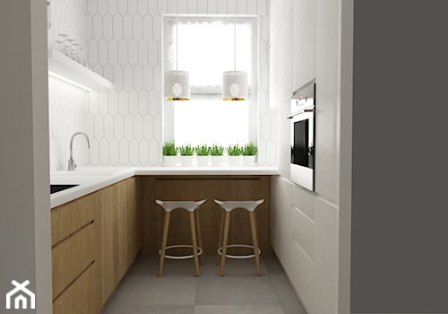 mieszkanie 45 m2 pod biuro/wynajem - Mała otwarta biała z zabudowaną lodówką kuchnia w kształcie litery l z oknem, styl skandynawski - zdjęcie od Grafika i Projekt architektura wnętrz