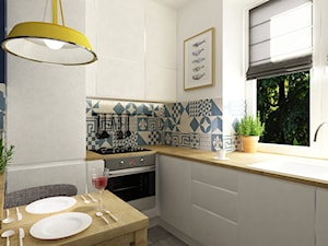 metamorfozy małej kuchni na woli - Mała zamknięta biała niebieska z zabudowaną lodówką z nablatowym zlewozmywakiem kuchnia w kształcie litery l, styl skandynawski - zdjęcie od Grafika i Projekt architektura wnętrz