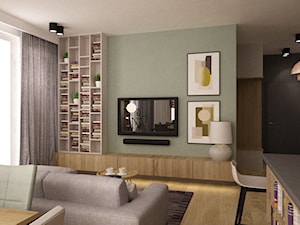 mieszkanie 90m2 z rowerem - Mały biały zielony salon z kuchnią z jadalnią z bibiloteczką, styl nowoczesny - zdjęcie od Grafika i Projekt architektura wnętrz