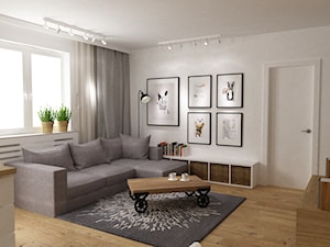 mieszkanie jasne w stylu nowoczesnym/skandynawskim 60m2 - Mały biały salon z bibiloteczką, styl skandynawski - zdjęcie od Grafika i Projekt architektura wnętrz