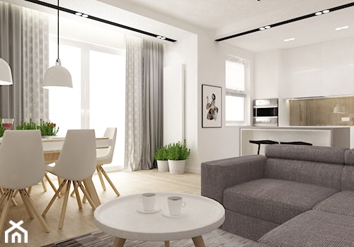 mieszkanie w bieli - Średnia biała jadalnia w salonie w kuchni, styl minimalistyczny - zdjęcie od Grafika i Projekt architektura wnętrz