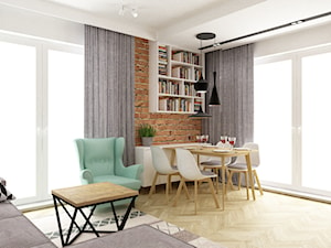 mieszkanie 50m2 w warszawie - Duży salon z jadalnią z bibiloteczką, styl skandynawski - zdjęcie od Grafika i Projekt architektura wnętrz