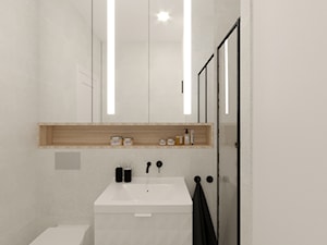 KAWALERKA NA WYNAJEM W CENTRUM MIASTA - Mała bez okna z lustrem z punktowym oświetleniem łazienka, styl nowoczesny - zdjęcie od MARTA PERSKA INTERIORS