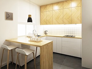 M3 Bronowice - Średnia otwarta z salonem biała z zabudowaną lodówką kuchnia w kształcie litery l, styl skandynawski - zdjęcie od SPOIWO studio