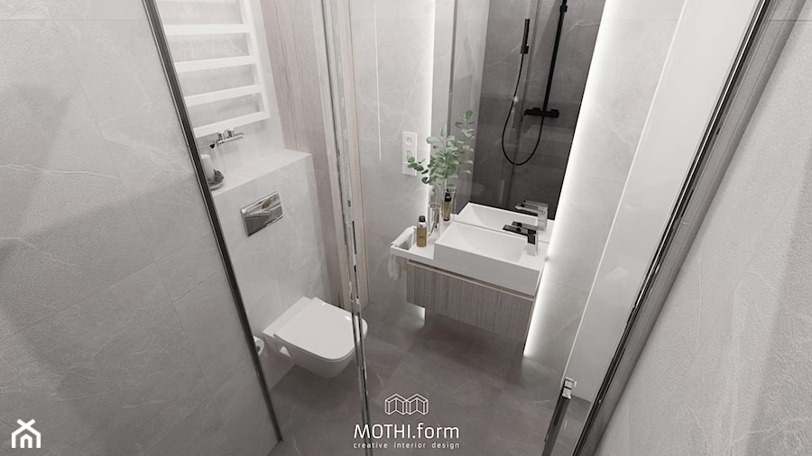 MOTHI.FORM ⋅ MIESZKANIE MONOCHROMATYCZNE ⋅ KRAKÓW - Mała bez okna z lustrem z punktowym oświetleniem łazienka, styl nowoczesny - zdjęcie od MOTHI.form