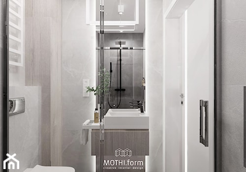 MOTHI.FORM ⋅ MIESZKANIE MONOCHROMATYCZNE ⋅ KRAKÓW - Mała bez okna z lustrem z punktowym oświetleniem łazienka, styl nowoczesny - zdjęcie od MOTHI.form