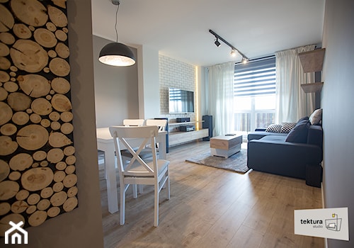 mieszkanie dla singla - Średni biały szary salon z jadalnią z tarasem / balkonem, styl minimalistyczny - zdjęcie od tekturastudio.pl