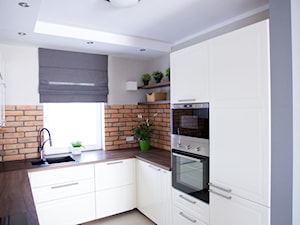 Bliźniak w Gruszczynie - Średnia otwarta biała kuchnia w kształcie litery u, styl skandynawski - zdjęcie od Norbert Perliński