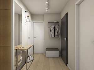 remont 46metrowego mieszkania - Średni z wieszakiem beżowy biały hol / przedpokój, styl nowoczesny - zdjęcie od Pracownia Wielkie Rzeczy