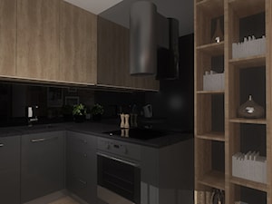 Mieszkanie w Warszawie - Średnia z salonem czarna z zabudowaną lodówką kuchnia w kształcie litery l, styl nowoczesny - zdjęcie od APA TROJANOWSCY