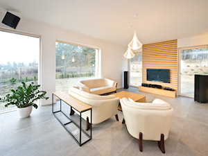 Kompleksowe wykończenia - Średni biały salon, styl minimalistyczny - zdjęcie od Fawre s.c.