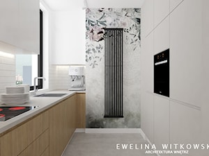 Mieszkanie na warszawskiej Ochocie - Średnia zamknięta biała z zabudowaną lodówką z podblatowym zlewozmywakiem kuchnia dwurzędowa z oknem, styl nowoczesny - zdjęcie od Ewelina Witkowska Architektura Wnętrz