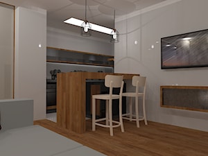 Salon z aneksem kuchennym. - zdjęcie od Dekomania Studio