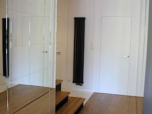 Apartament 170 m2 - Średni biały hol / przedpokój, styl minimalistyczny - zdjęcie od INSOLITO INTERIOR