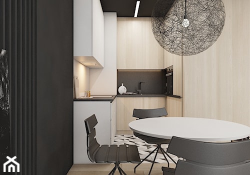 mieszkanie w Katowicach 2018 - Mała otwarta z kamiennym blatem biała czarna z zabudowaną lodówką kuchnia w kształcie litery u, styl nowoczesny - zdjęcie od A2 STUDIO pracownia architektury