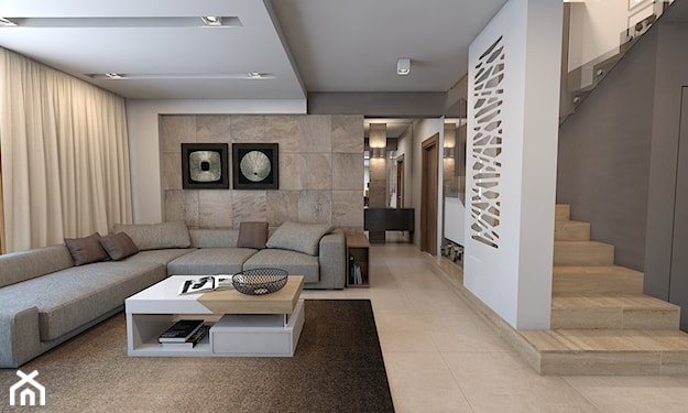 nowoczesny salon, biały stolik, ściana z beżowego kamienia ozdobnego, brązowy dywan