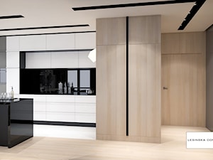 APARTAMENT PONADCZASOWY SZARY - Duża otwarta czarna z zabudowaną lodówką z podblatowym zlewozmywakiem kuchnia jednorzędowa, styl nowoczesny - zdjęcie od LESINSKA CONCEPT