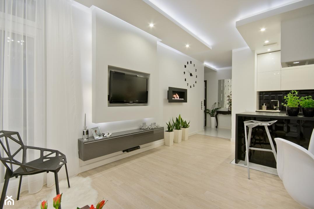 Nowoczesne mieszkanie w Gdańsku - Mały biały salon z kuchnią, styl nowoczesny - zdjęcie od INDEZZO - Homebook
