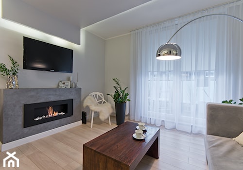 Mieszkanie w Gdańsku - Średni szary salon z tarasem / balkonem, styl nowoczesny - zdjęcie od INDEZZO