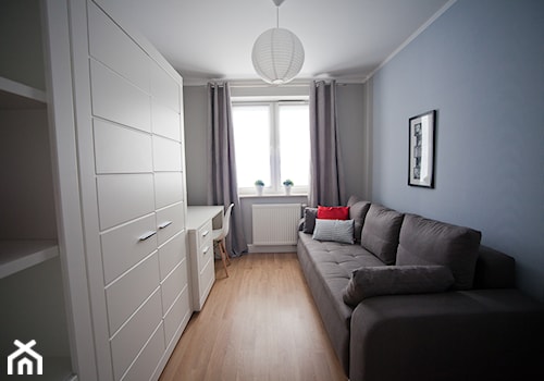 Mieszkanie pod wynajem I - Średnie z sofą niebieskie z fotografiami na ścianie biuro, styl skandynawski - zdjęcie od Studio Decorativa Design