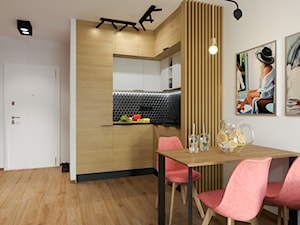 KAWALERKA PANA MARCINA - Średnia otwarta z salonem biała czarna z zabudowaną lodówką z podblatowym zlewozmywakiem kuchnia w kształcie litery l, styl industrialny - zdjęcie od Izabela Widomska Wnętrza