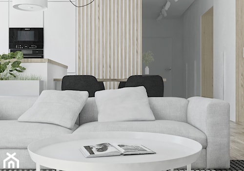 Mieszkanie w skandynawskim stylu - Mały szary salon z kuchnią z jadalnią - zdjęcie od Illa Design