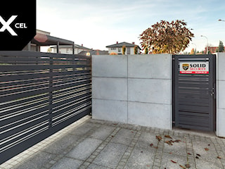 Black Heron. Nowoczesne ogrodzenie z betonu architektonicznego i aluminium