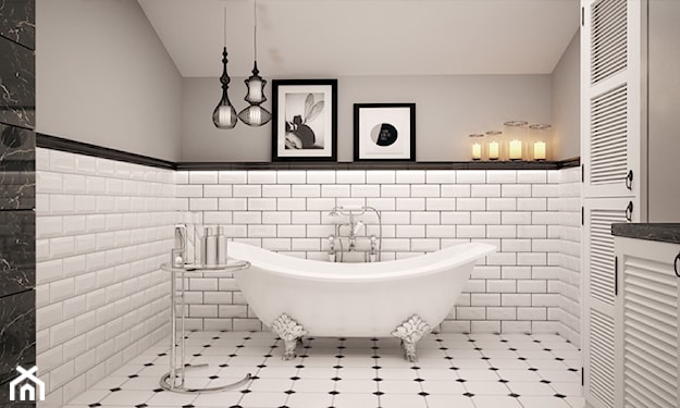 jasna łazienka z białymi kaflami na ścianie z wanną wolnostojącą