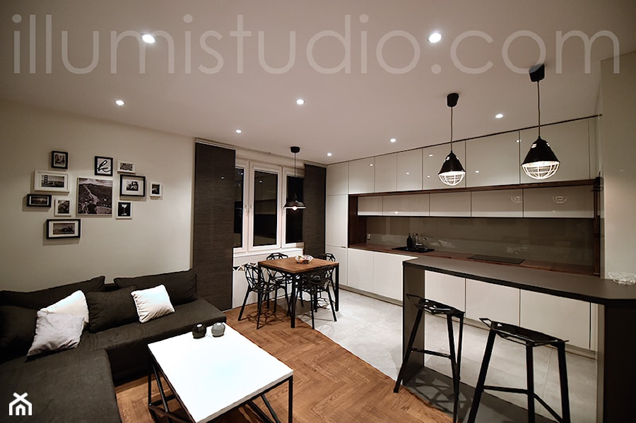 Duża otwarta z salonem biała z zabudowaną lodówką kuchnia jednorzędowa z wyspą lub półwyspem, styl skandynawski - zdjęcie od ILLUMISTUDIO