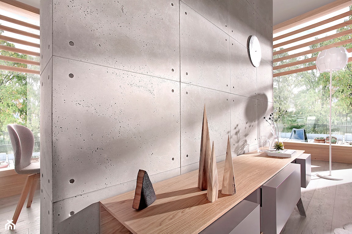 beton na ścianie, płyty z betonu na ścianie, komoda z szufladami, drewniane dekoracje