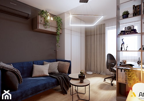 Gabinet z niebieską sofą - zdjęcie od Studio Projektowe Atoato