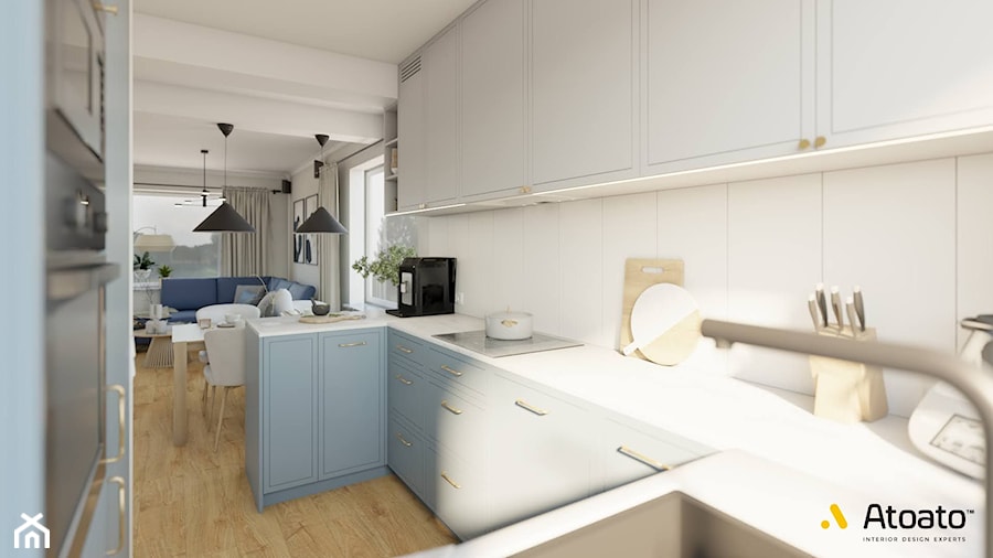 jasna kuchnia z niebieskimi szafkami - zdjęcie od Studio Projektowe Atoato