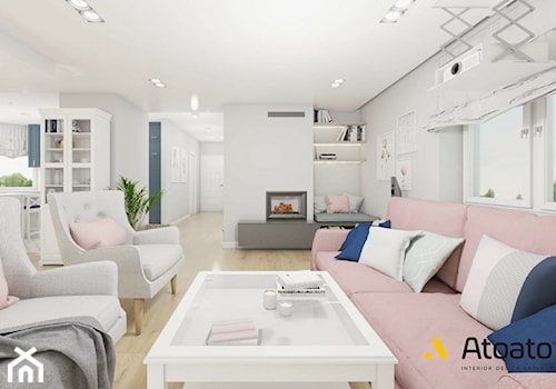salon z różowa sofą - zdjęcie od Studio Projektowe Atoato