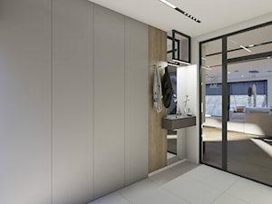 Wiatrołap z dużą białą szafą - zdjęcie od Studio Projektowe Atoato