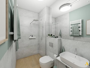 Łazienka z jasnymi szarymi płytkami - zdjęcie od Studio Projektowe Atoato