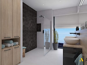 łazienka z czarnym dekorem pod prysznicem - zdjęcie od Studio Projektowe Atoato