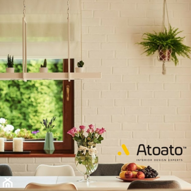 jadalnia z białą cegłą w tle - zdjęcie od Studio Projektowe Atoato