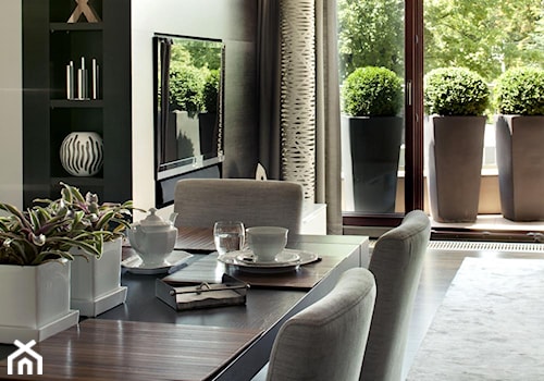 Apartament modernistyczny - Średnia jadalnia w salonie, styl nowoczesny - zdjęcie od CKTprojekt