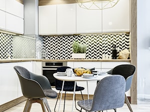 Mieszkanie pokazowe - Średnia z salonem z zabudowaną lodówką kuchnia w kształcie litery l, styl skandynawski - zdjęcie od Q2Design