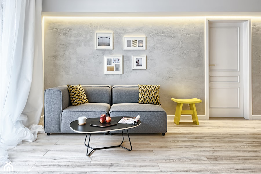 Mieszkanie pokazowe - Średni biały szary salon, styl skandynawski - zdjęcie od Q2Design