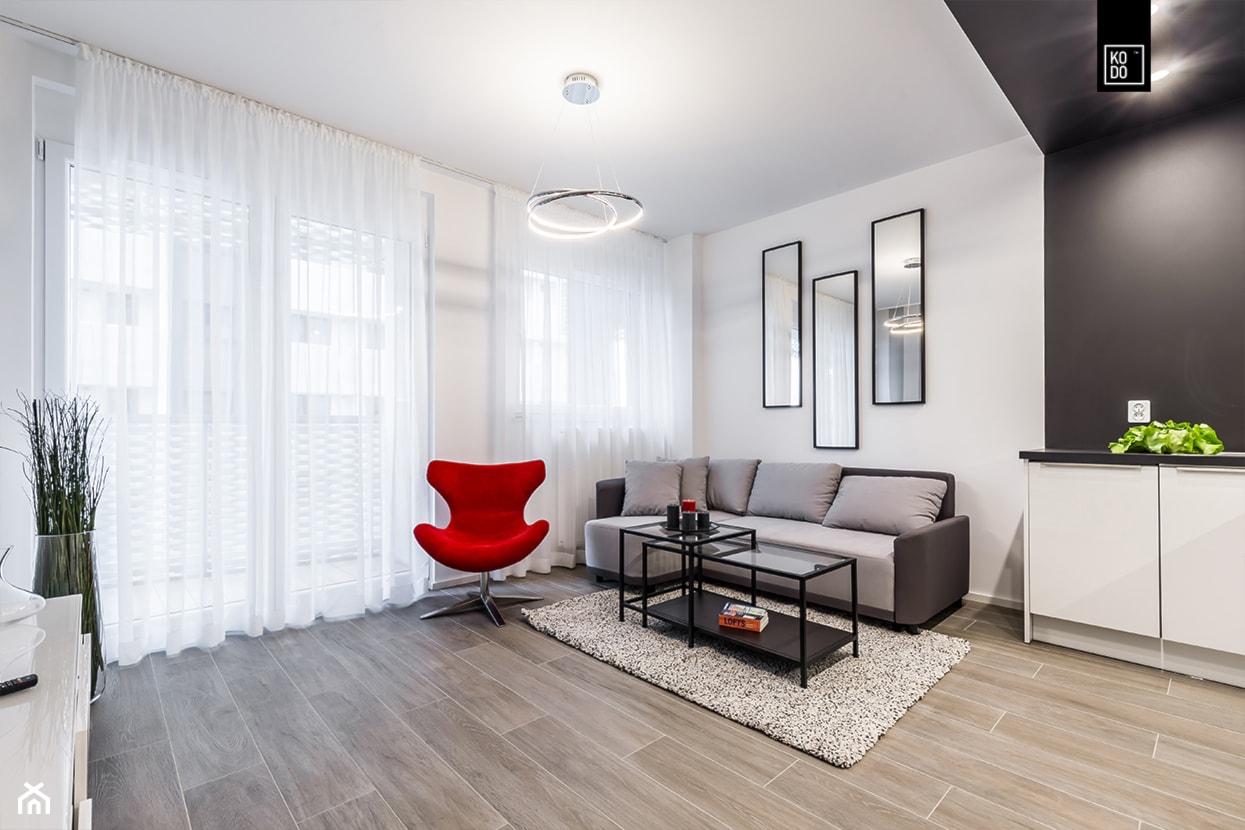 GEOMETRIA KONTROLOWANA - Średni biały czarny salon, styl minimalistyczny - zdjęcie od KODO projekty i realizacje wnętrz - Homebook