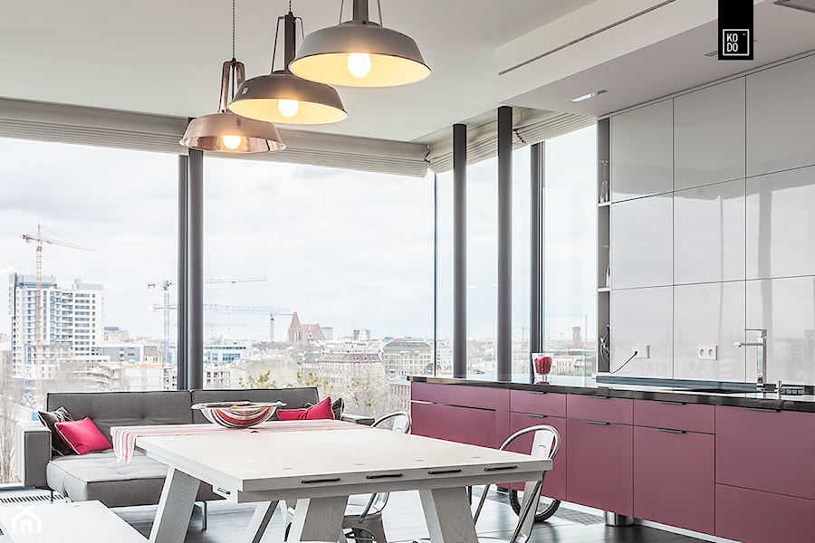 ROSSI_ODRA TOWER - Średnia z czerwonymi frontami otwarta z salonem kuchnia jednorzędowa, styl nowoczesny - zdjęcie od KODO projekty i realizacje wnętrz