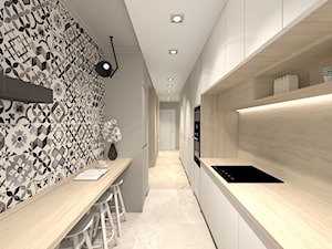 Świetliste mieszkanie z nutką energii - Średnia otwarta szara z zabudowaną lodówką kuchnia dwurzędowa, styl skandynawski - zdjęcie od Bubbles Studio