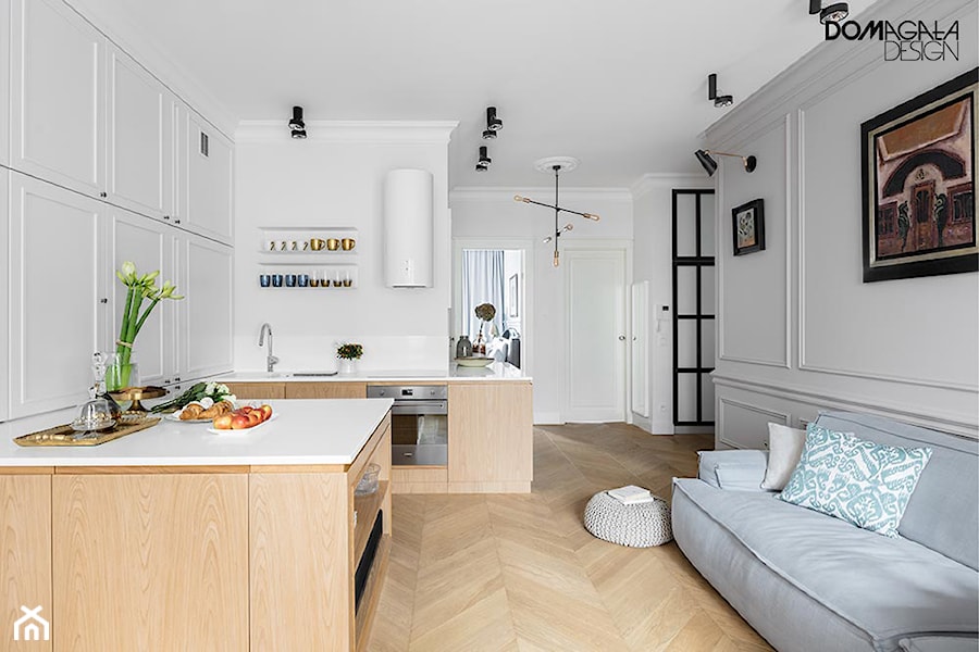 Miejski Styl - konkurs - Mały biały salon z kuchnią, styl nowoczesny - zdjęcie od DOMagała Design